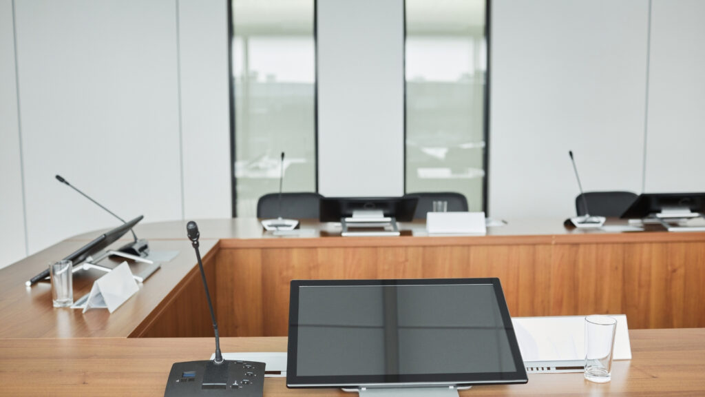 Conference room delegate microphone and touch panel control system for professional AV integration